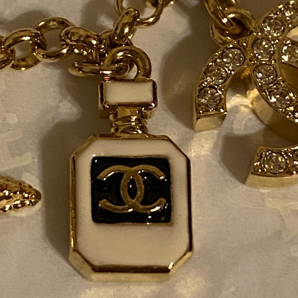 New authentic Chanel Gold and Blue Charm Bracelet - Picture 10 of 15